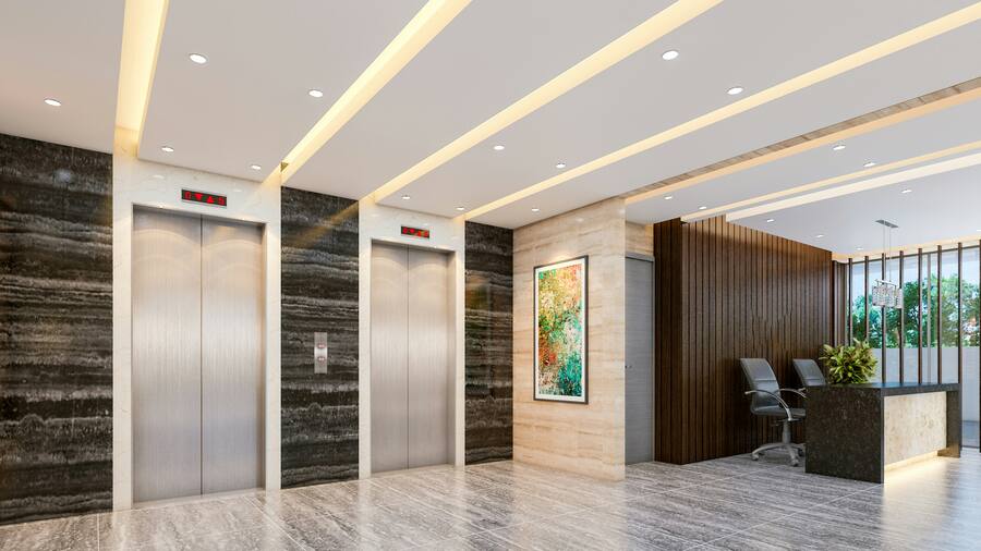 Stone and veneer lobby with concealed services.