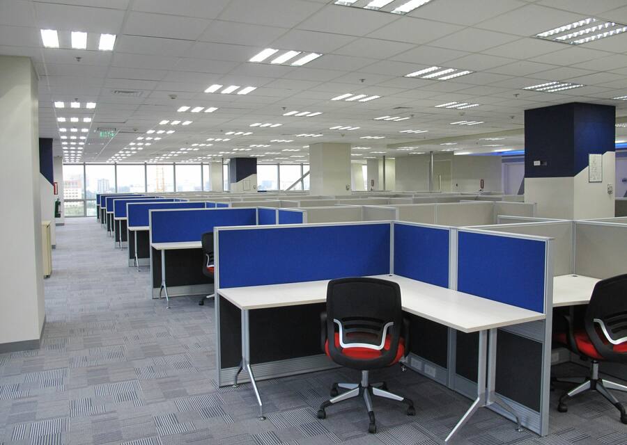 Full floor of workstations with power and data routed to each pod.